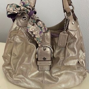 Champagne suede Coach shoulder bag with scarf